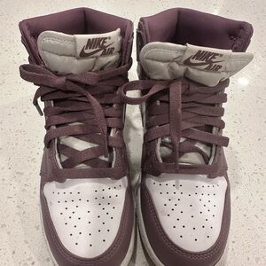 Jordan’s Nike High-Top Sneakers in lavender and White